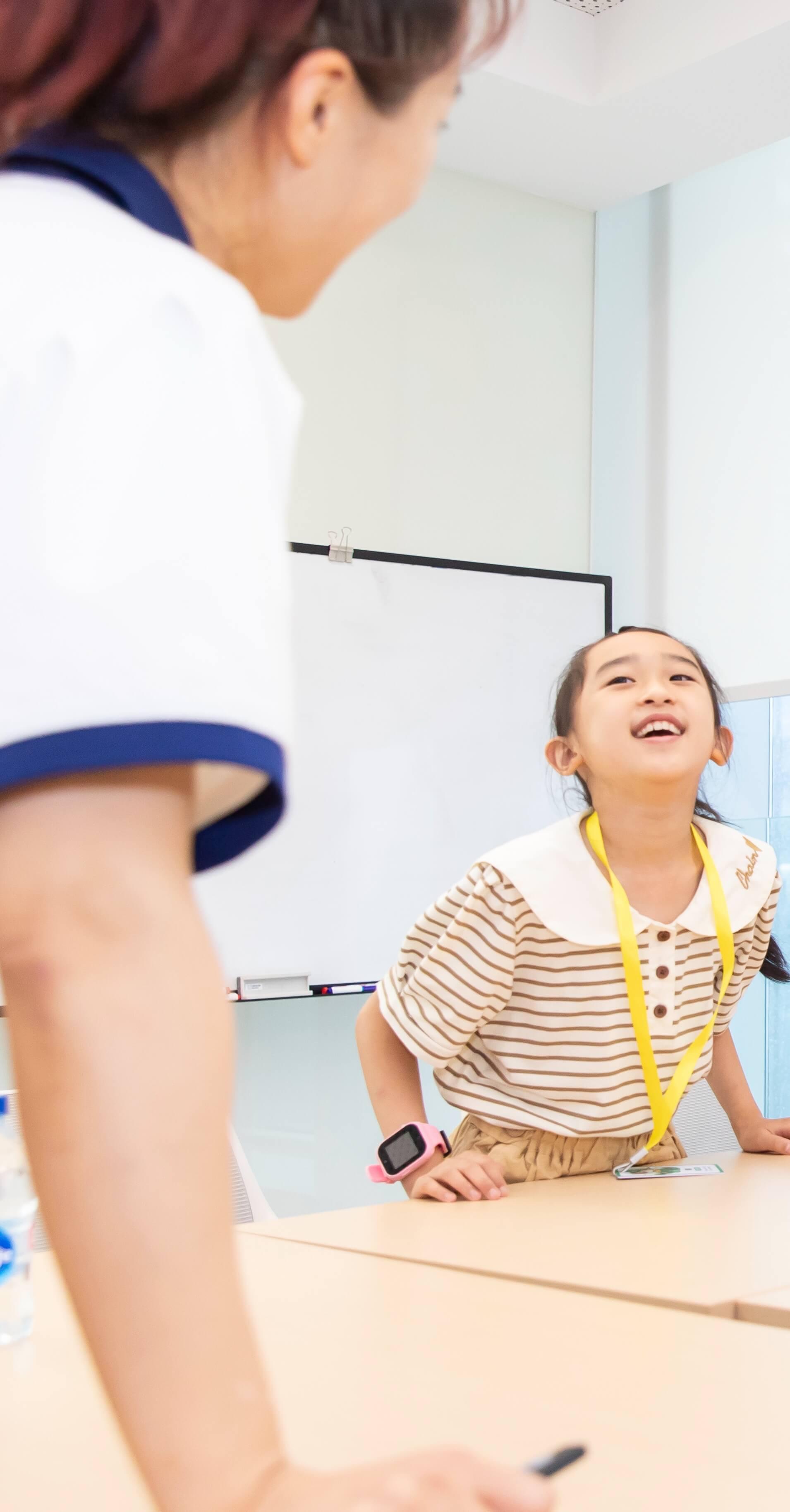 Game masters guiding children during an activity